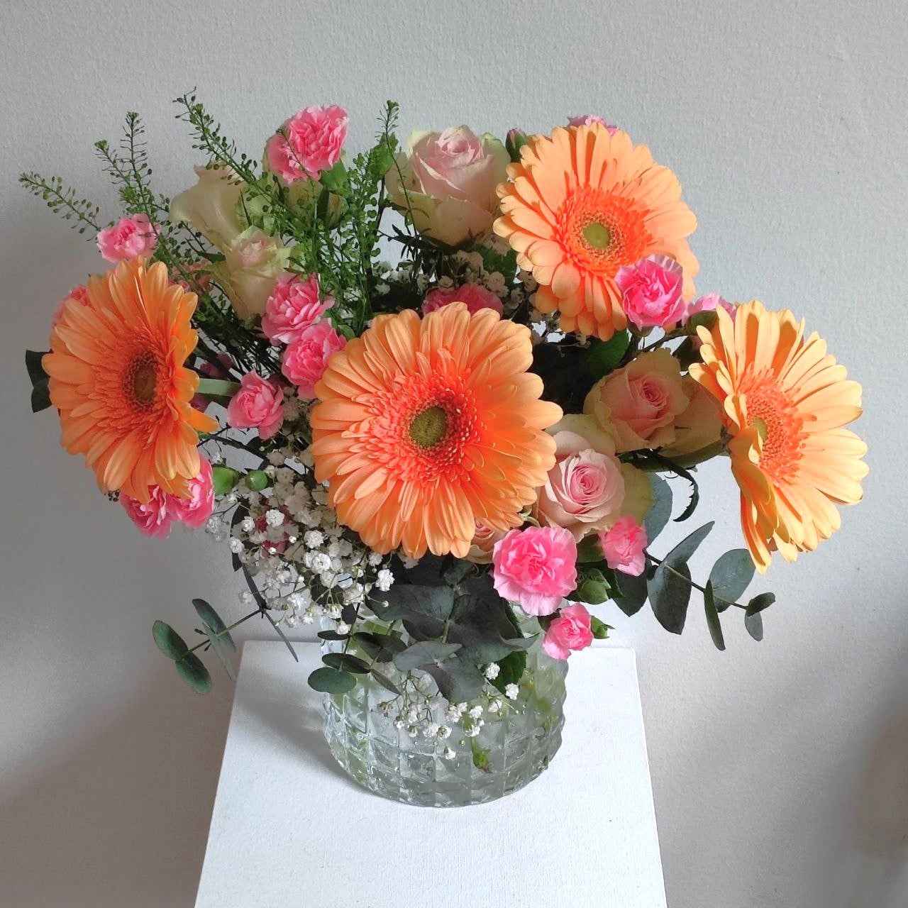 Bright bouquet with orange gerberas