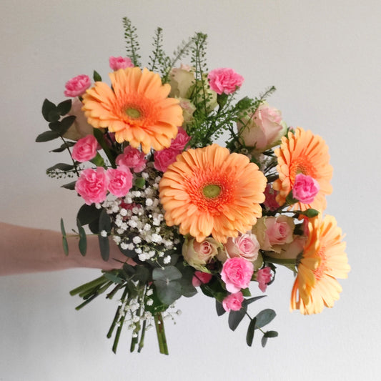 Bright bouquet with orange gerberas