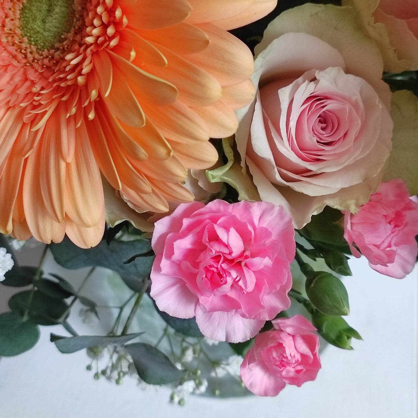 Bright bouquet with orange gerberas