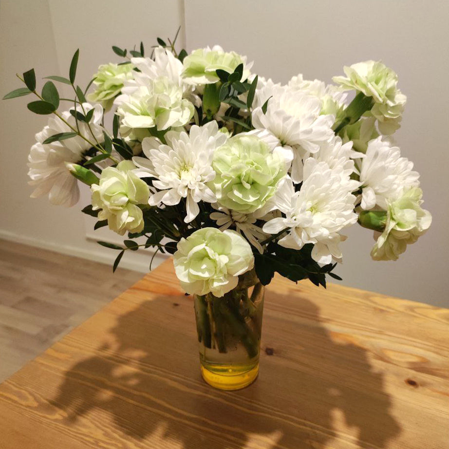 Delicate bouquet with white chrysanthemums.