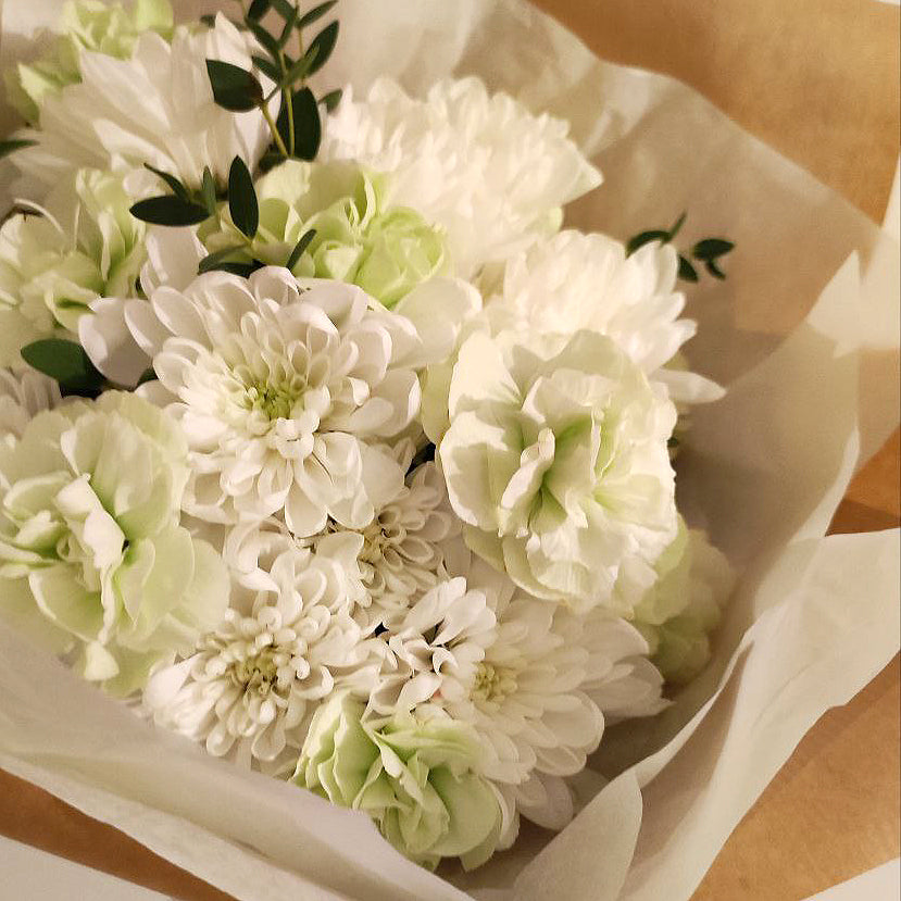 Delicate bouquet with white chrysanthemums.