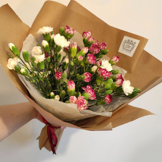 Lovely bouquet with bushy carnations.