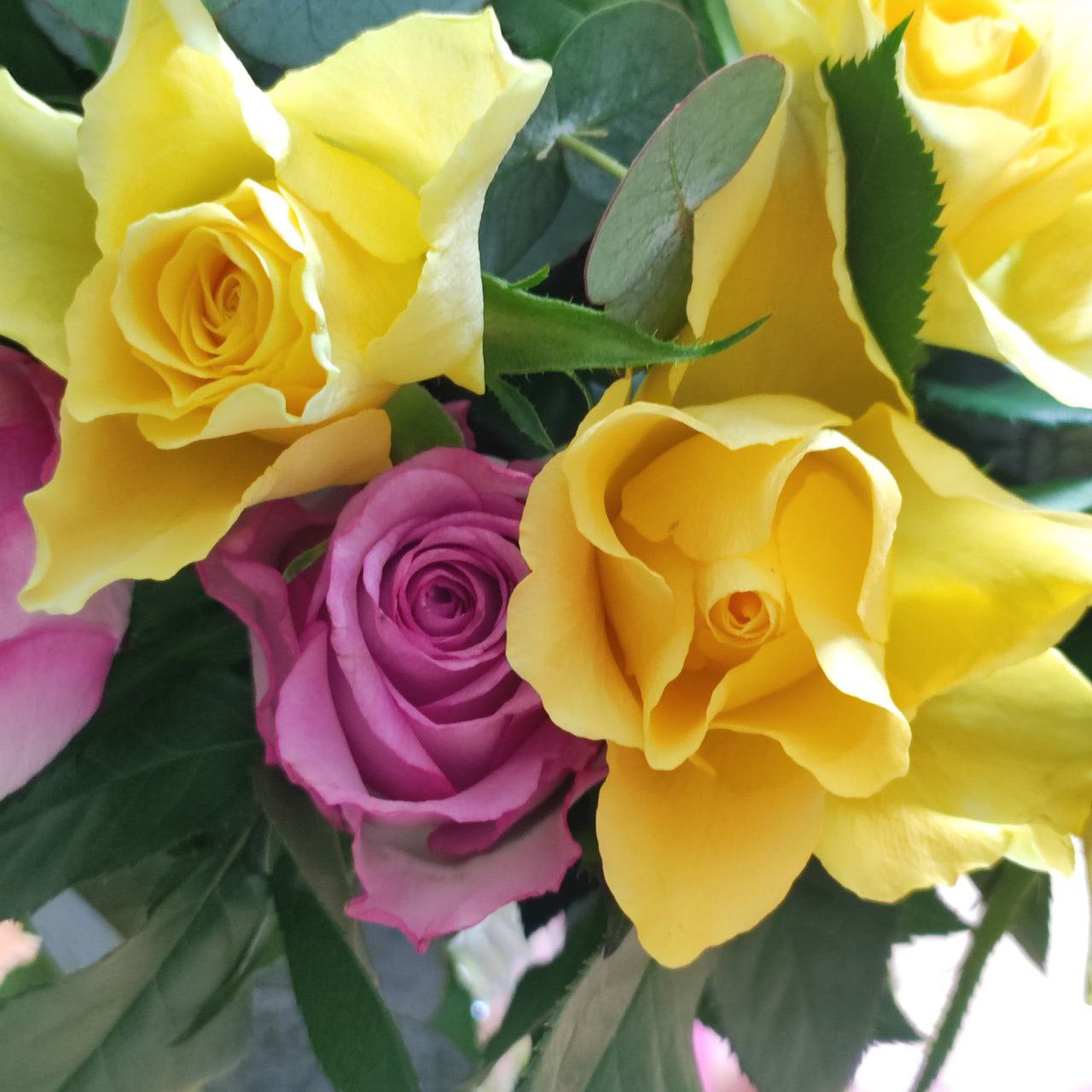 Gorgeous bouquet with delicate roses and eucalyptus.