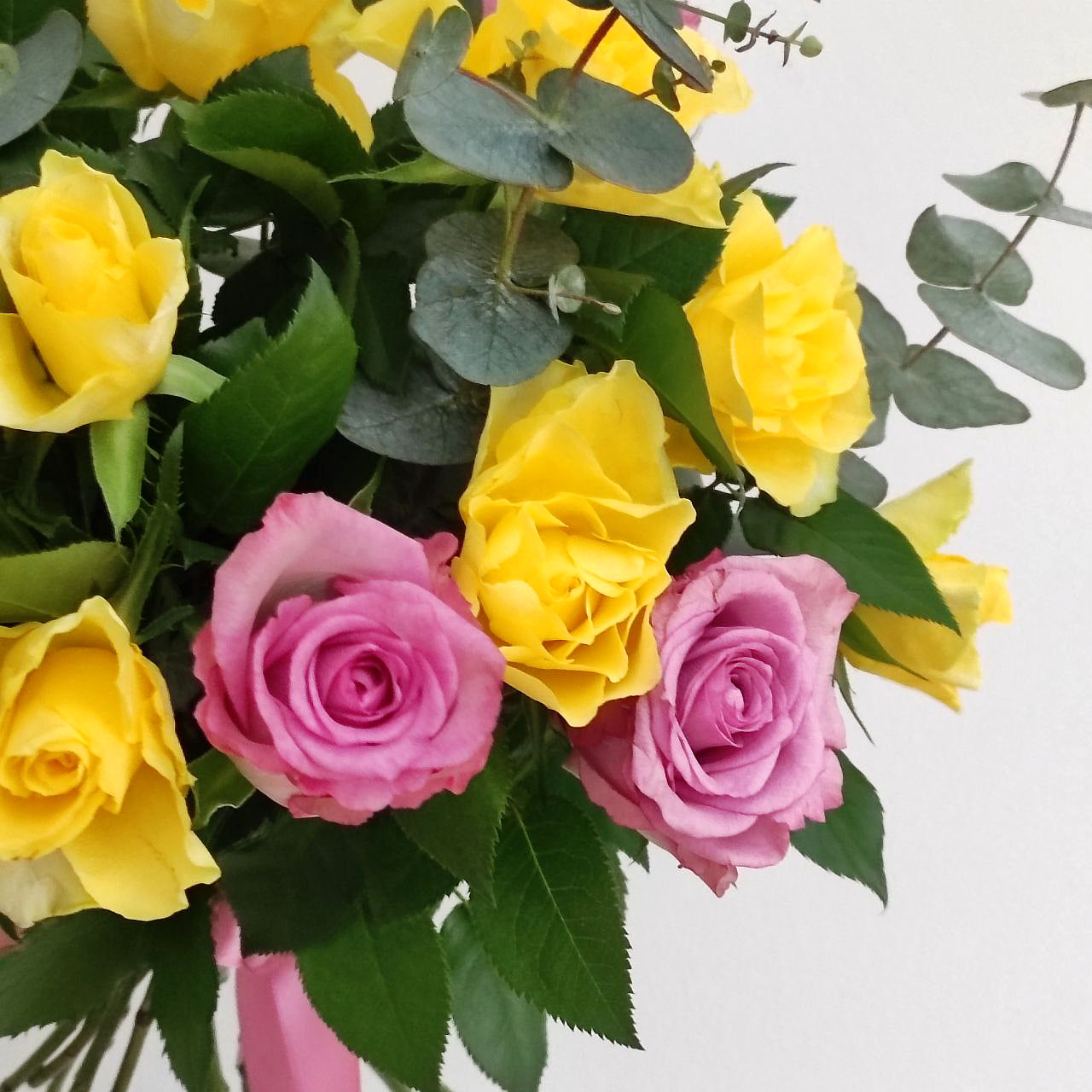 Gorgeous bouquet with delicate roses and eucalyptus.