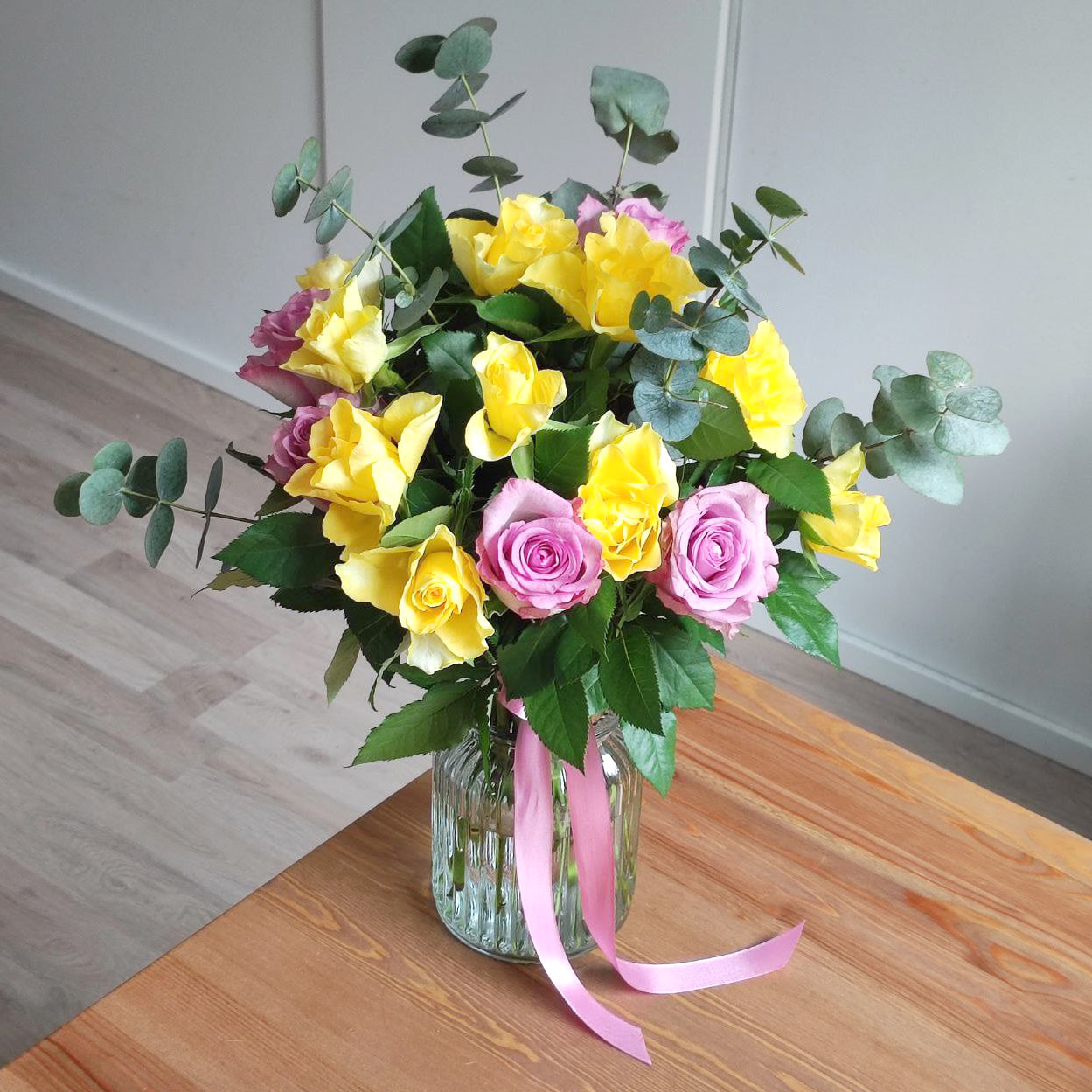 Gorgeous bouquet with delicate roses and eucalyptus.