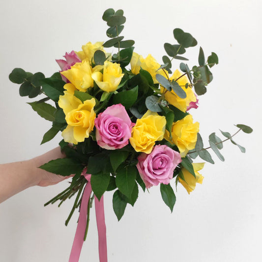 Gorgeous bouquet with delicate roses and eucalyptus.