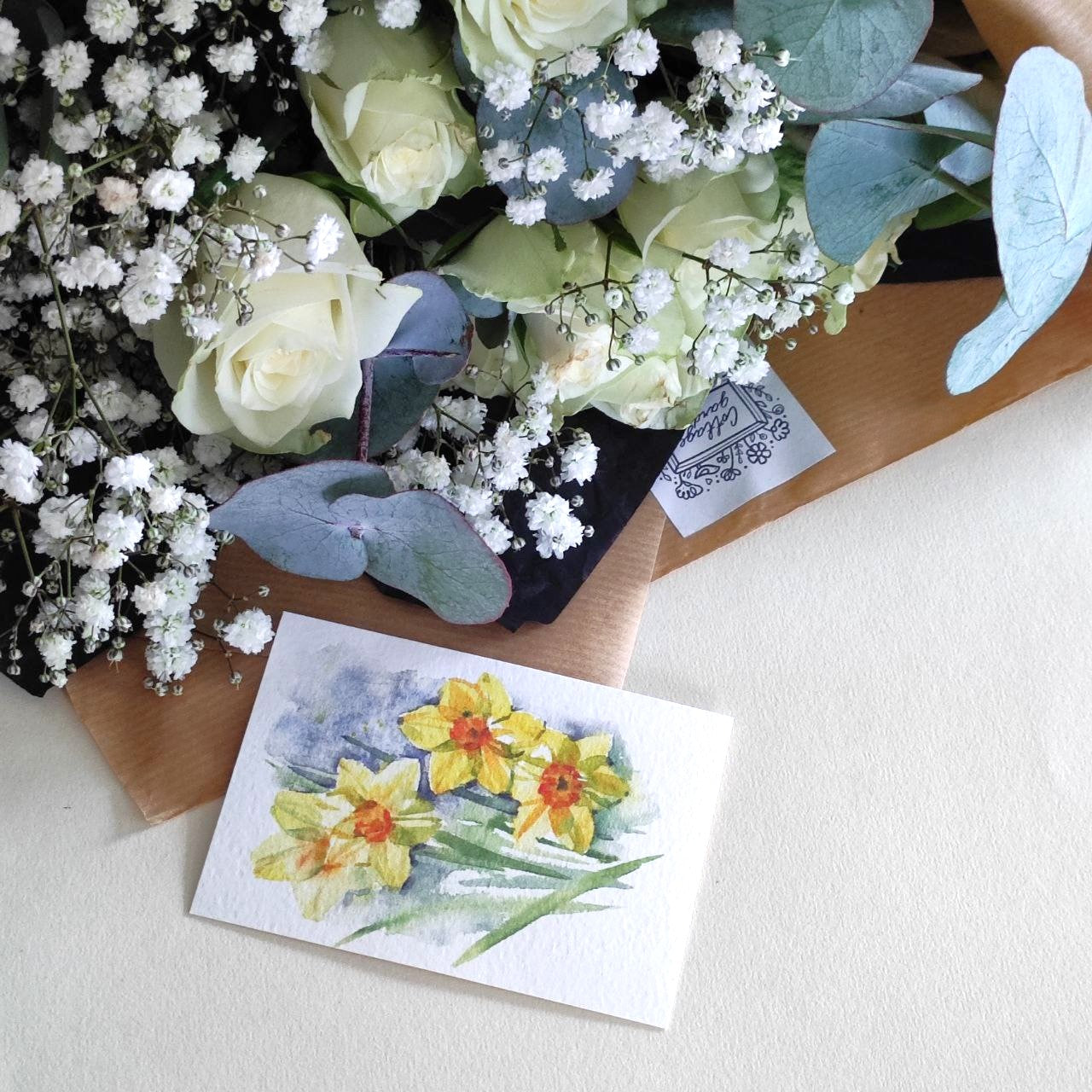 Starry Night. Bouquet of white roses and gypsophila in dark package